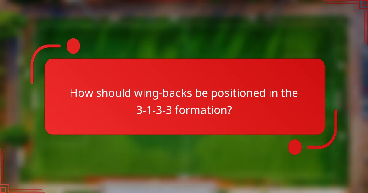 How should wing-backs be positioned in the 3-1-3-3 formation?